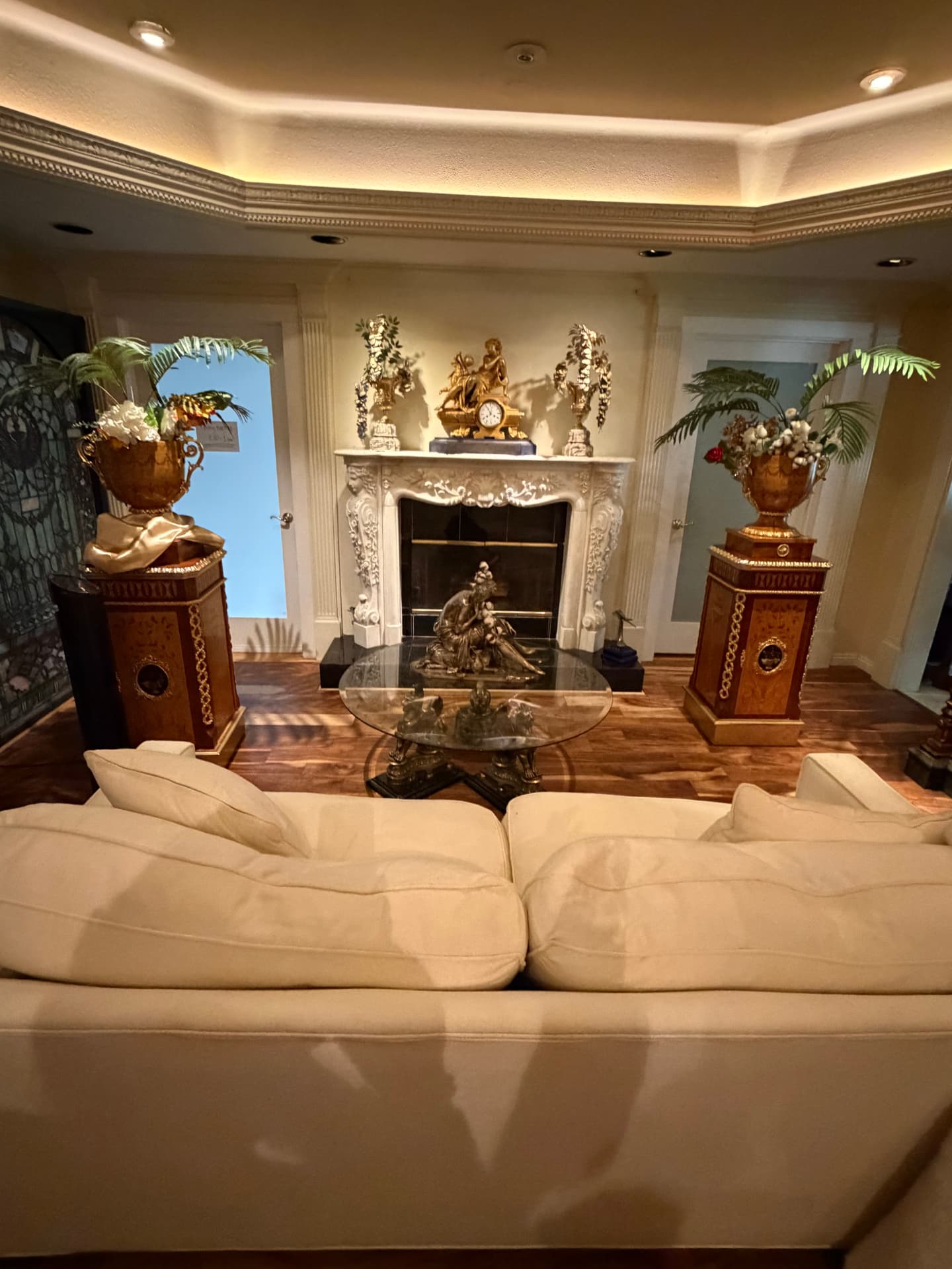 Ornate fireplace room and antique furnishings inside Universal Sanctuary Church